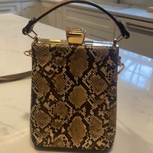 Neutral color snakeskin look clutch/crossbody bag